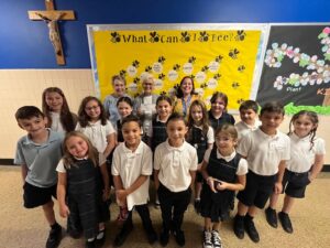 Louise Mailloux and Sue Bernier of Woonsocket presented the St Jean Baptiste Educational Foundation $600 Catholic School grant to the Greater Woonsocket Catholic Regional School. The third grade students were very happy to be in the photo and all said “thank you”. In the photo is Jennifer DeOliveira, Principal. Your generosity helps us provide a strong Catholic education rooted in Gospel values, ensuring our children grow into compassionate, faith-filled leaders.