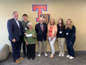 Maurice and Gloria Pilotte, and Diane Morin, CFL Chapter 91, Manchester, NH, presented the St Jean Baptiste Educational Foundation Catholic School Grant donation check to St. Joseph School. Students who joined them are all seniors: Elise White, Bella Santosuosse and Connor Cote and President of Schools, Nathan Stanton.